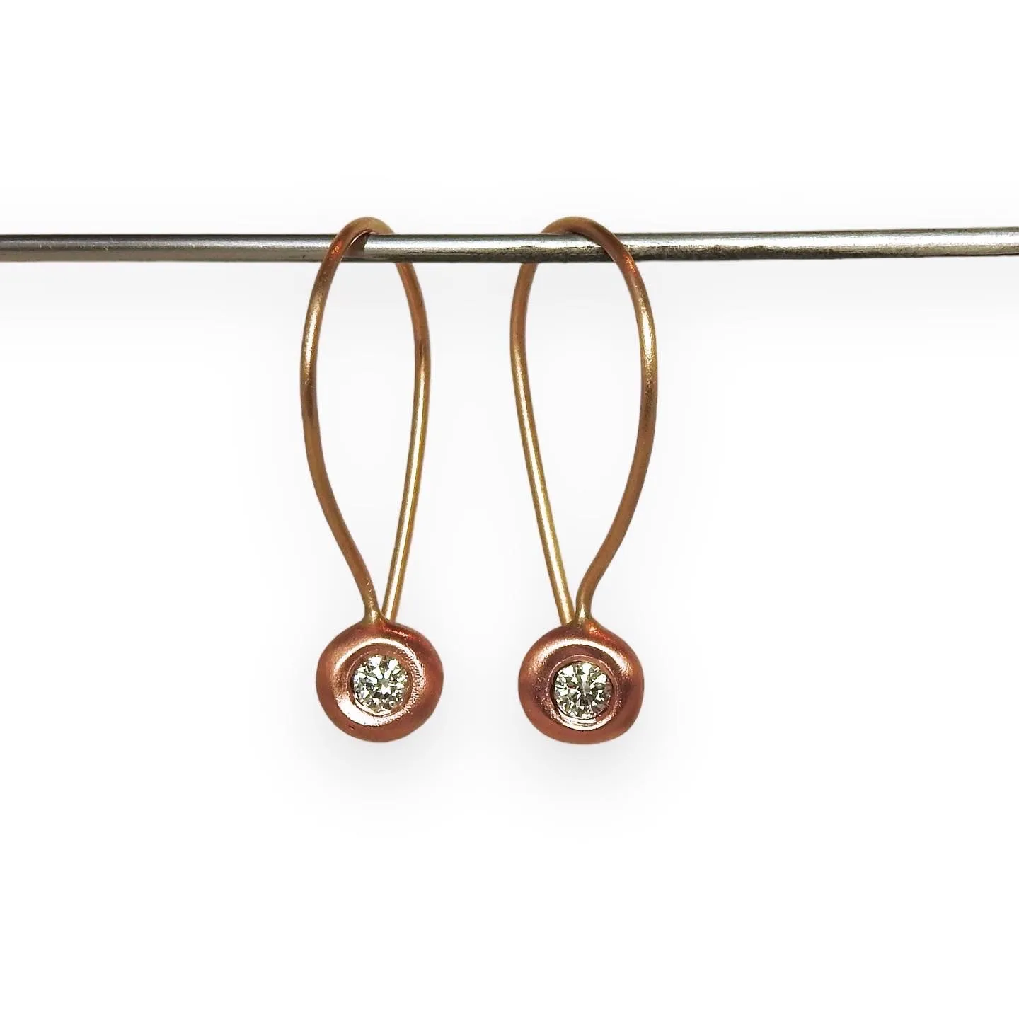 Diamond in the rough hoops in red and yellow gold