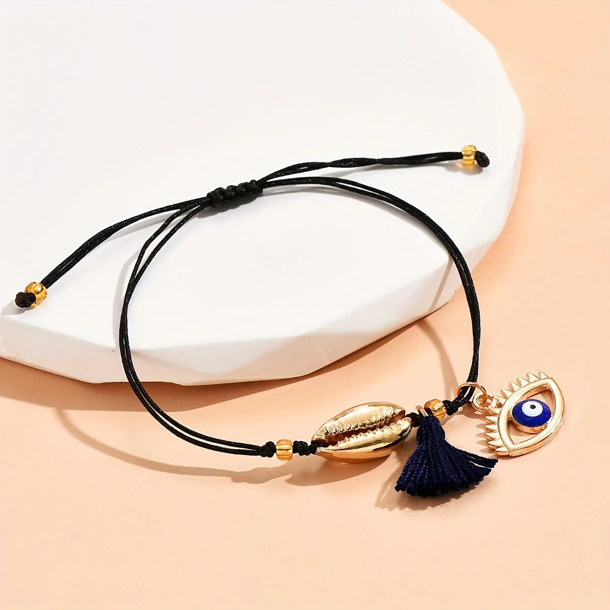 Enhance your style with Devils Eye Pendant Anklet