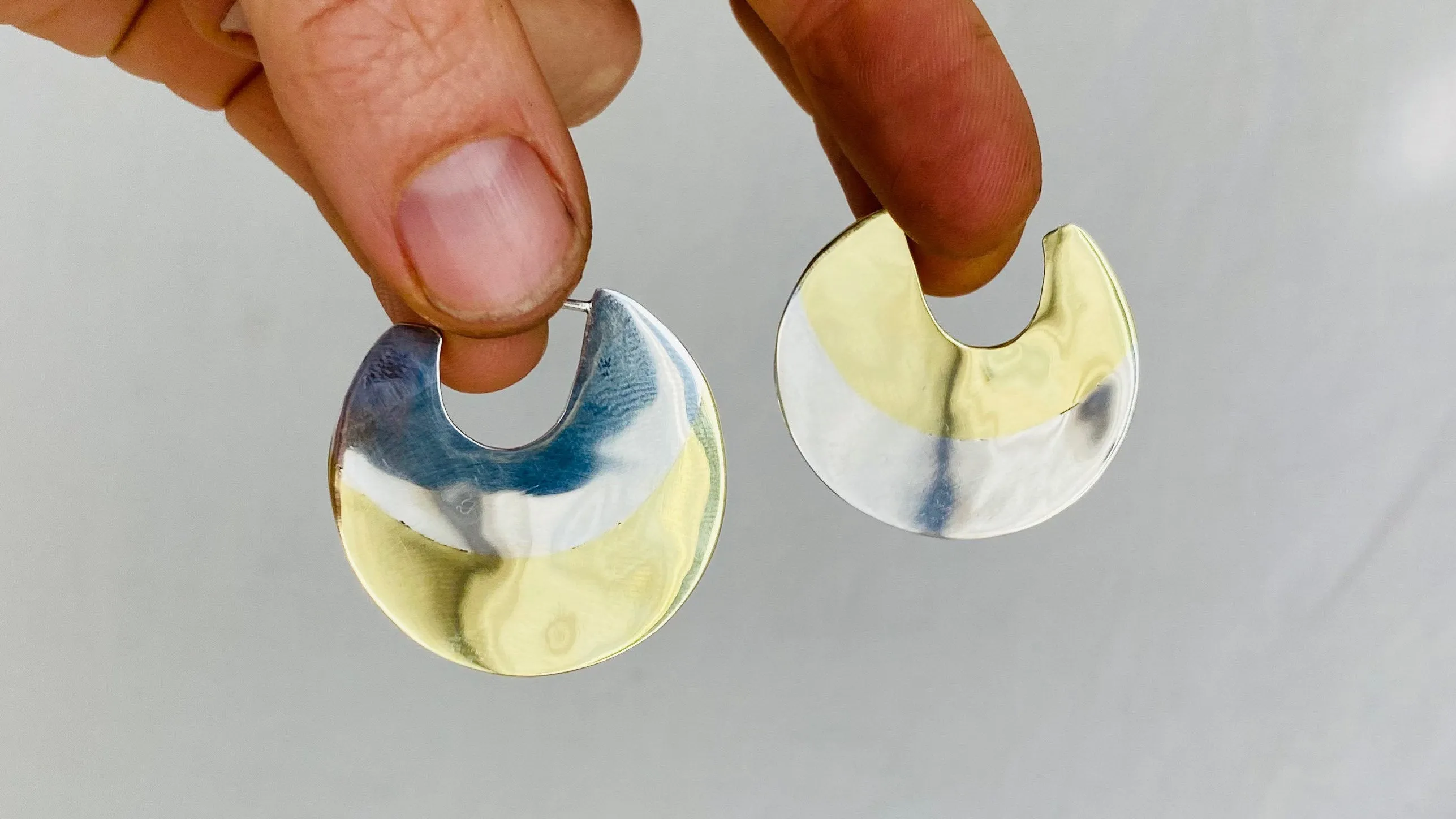 Sterling Silver and Brass Flat Hoop Earrings.
