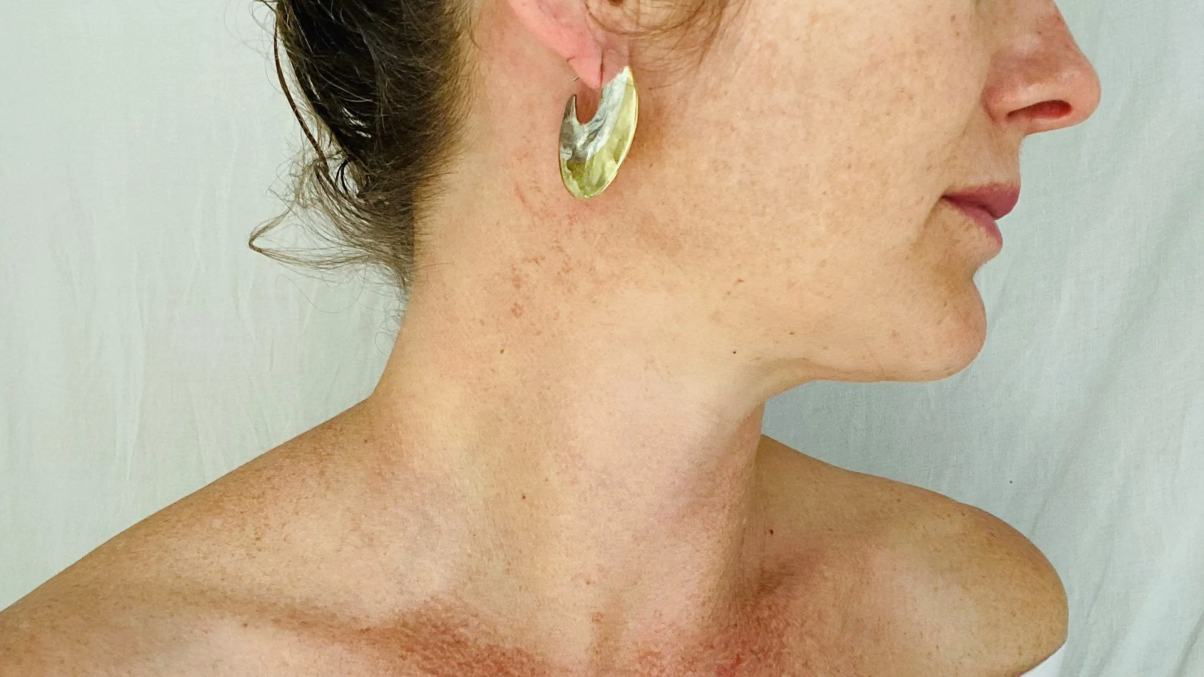 Sterling Silver and Brass Flat Hoop Earrings.