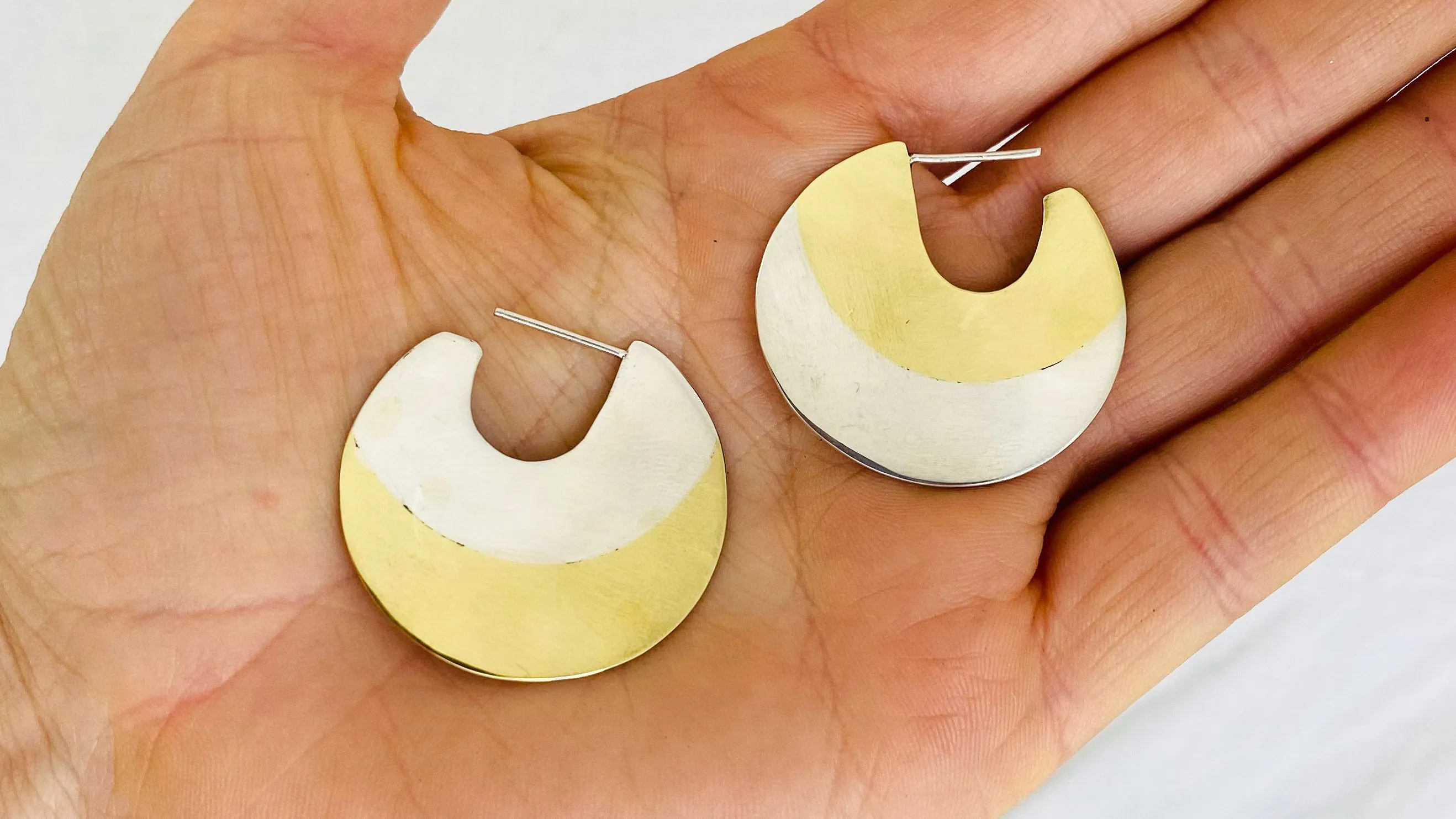 Sterling Silver and Brass Flat Hoop Earrings.